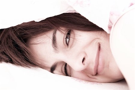 Beautiful young woman sleeping on bed in her bedroom at home in the morning. Stock Photo - Budget Royalty-Free & Subscription, Code: 400-04822462