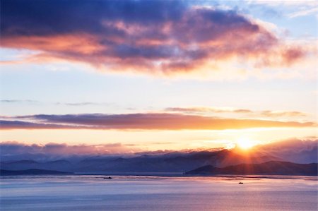 person climbing a volcano - bay  an kamchatka with volcanoes in city boundaries Stock Photo - Budget Royalty-Free & Subscription, Code: 400-04823179