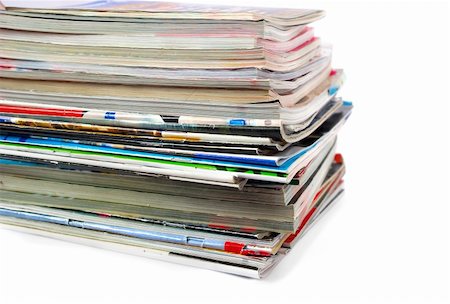 simsearch:400-07217367,k - Heap of old magazines isolated on white Stock Photo - Budget Royalty-Free & Subscription, Code: 400-04823226