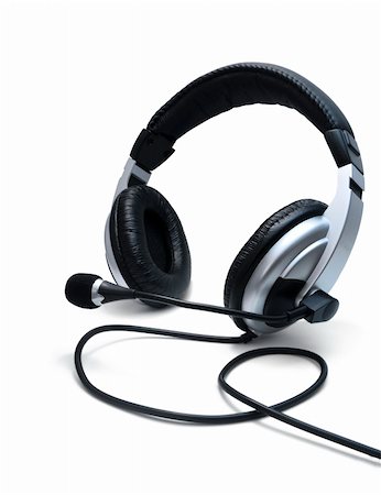 simsearch:400-07516047,k - Stereo headphones with microphone isolated on white Stockbilder - Microstock & Abonnement, Bildnummer: 400-04823223