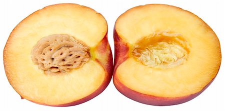 peach slice - Peach halves isolated on the white background Stock Photo - Budget Royalty-Free & Subscription, Code: 400-04823334