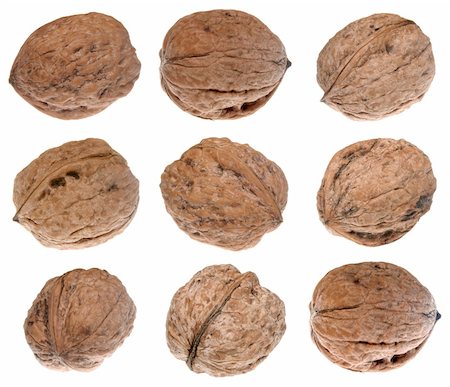simsearch:400-06520688,k - Group of walnuts isolated on white background Stock Photo - Budget Royalty-Free & Subscription, Code: 400-04823459
