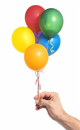 simsearch:400-04713054,k - Hand holding colorful helium balloons isolated on white background Photographie de stock - Aubaine LD & Abonnement, Code: 400-04834004