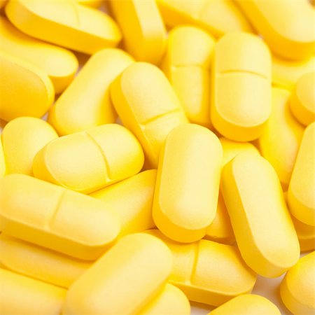 Medicinal pills piled up a bunch of closeup Stock Photo - Budget Royalty-Free & Subscription, Code: 400-04834667