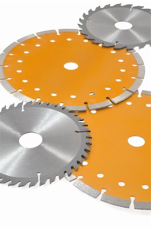 Circular saw blades isolated on white Stockbilder - Microstock & Abonnement, Bildnummer: 400-04835039