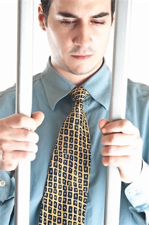 Isolated business man in jail Stock Photo - Budget Royalty-Free & Subscription, Code: 400-04835126