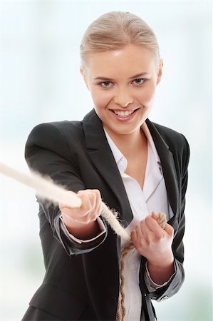 simsearch:400-05009097,k - Businesswoman pulling on a piece of rope. Stock Photo - Budget Royalty-Free & Subscription, Code: 400-04835456