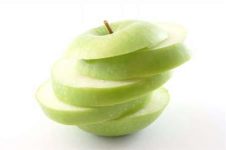 simsearch:400-05033339,k - A cutted apple isolated on a white backgound. Stock Photo - Budget Royalty-Free & Subscription, Code: 400-04835723