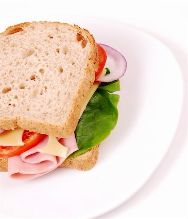 Healthy ham sandwich with cheese, tomatoes on white background Stock Photo - Budget Royalty-Free & Subscription, Code: 400-04835810