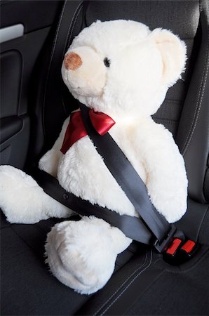 safety first concept with teddy bear in car Stock Photo - Budget Royalty-Free & Subscription, Code: 400-04835881