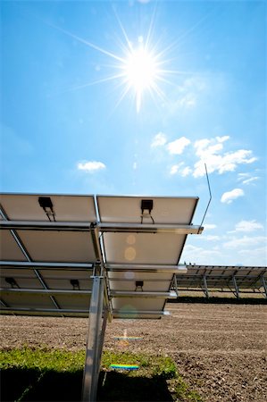 Solar Panel with Lens Flares and blue Sky Stockbilder - Microstock & Abonnement, Bildnummer: 400-04835926