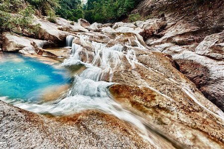 Beautiful waterfall at summer sunny day. Vietnam Stock Photo - Budget Royalty-Free & Subscription, Code: 400-04836047