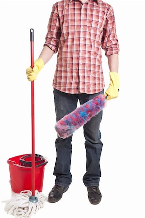 Young sweeping man workwear. Isolated on white background Foto de stock - Super Valor sin royalties y Suscripción, Código: 400-04836276