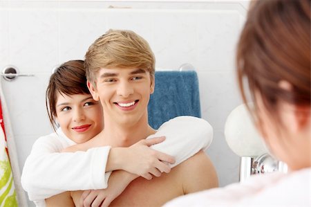 face cream male - Young couple at bathroom. Isolated on white. Stock Photo - Budget Royalty-Free & Subscription, Code: 400-04836300