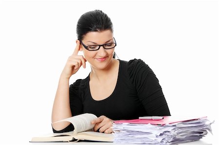 simsearch:400-04622035,k - Young student woman learning at the desk, isolated on white Stock Photo - Budget Royalty-Free & Subscription, Code: 400-04836576