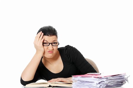 simsearch:400-05678148,k - Bored young student woman at the desk , isolated on white background Stockbilder - Microstock & Abonnement, Bildnummer: 400-04836577