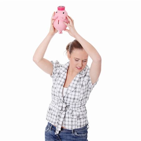simsearch:400-04312713,k - Young woman trying to get money from her piggy bank, isolated on white background Photographie de stock - Aubaine LD & Abonnement, Code: 400-04836609
