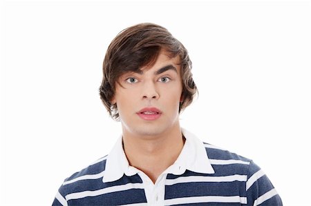 Young man with surprise expression on his face Stock Photo - Budget Royalty-Free & Subscription, Code: 400-04836635