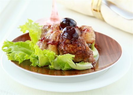 cooked meat duck with berry sauce and salad on a plate Stock Photo - Budget Royalty-Free & Subscription, Code: 400-04836781