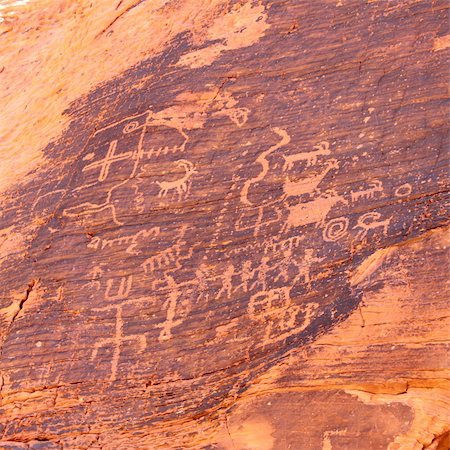 Strange petroglyphs on a rock wall at Valley of Fire State Park in Nevada. Stock Photo - Budget Royalty-Free & Subscription, Code: 400-04837154