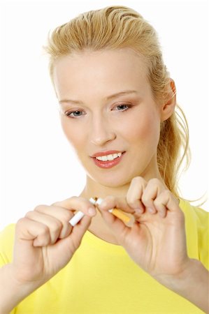 quitting - Young beautiful caucasian woman breaking cigarette , over white Stock Photo - Budget Royalty-Free & Subscription, Code: 400-04837299