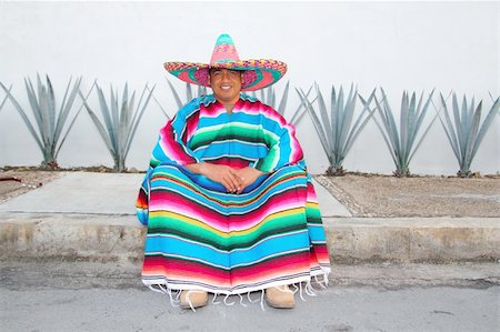 Mexican man sit sombrero serape and agave cactus smiling Stock Photo - Budget Royalty-Free & Subscription, Code: 400-04837521