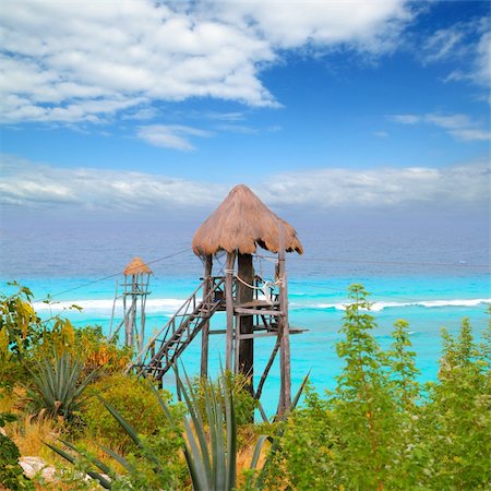 Caribbean zip line tyrolean turquoise sea  in  Mexico Stock Photo - Budget Royalty-Free & Subscription, Code: 400-04837684