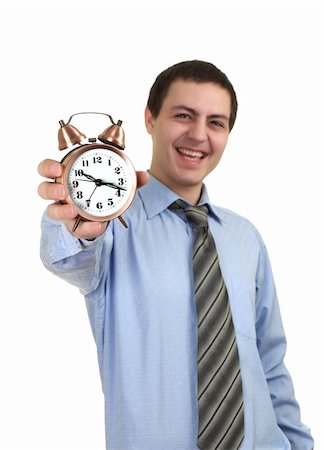businessman with an alarm clock in a hand. Isolated on white background Fotografie stock - Microstock e Abbonamento, Codice: 400-04837700