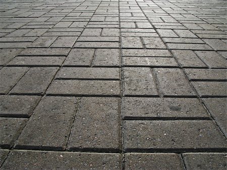 excitator (artist) - The road surface of concrete blocks Foto de stock - Super Valor sin royalties y Suscripción, Código: 400-04838081