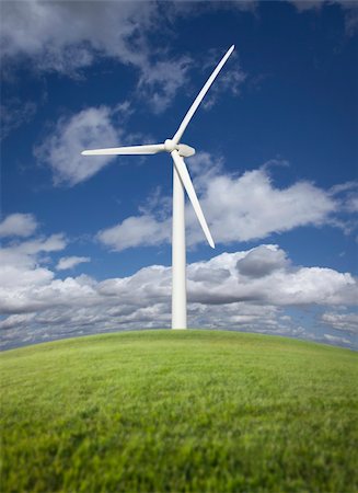 power station turbine - Single Wind Turbine Over Grass Field, Dramatic Sky and Clouds. Stock Photo - Budget Royalty-Free & Subscription, Code: 400-04839247