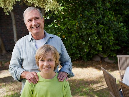 simsearch:400-06097548,k - Boy with his Grandfather looking at the camera Photographie de stock - Aubaine LD & Abonnement, Code: 400-04830035