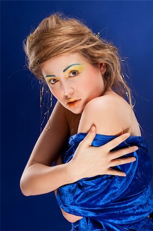 simsearch:400-06083238,k - woman with glamour make-up on blue background Stock Photo - Budget Royalty-Free & Subscription, Code: 400-04830107