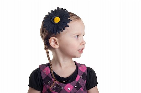 strotter13 (artist) - A young girl looking to her left.  As if she is saying EXCUSE ME, I am talking over here. Stock Photo - Budget Royalty-Free & Subscription, Code: 400-04830517