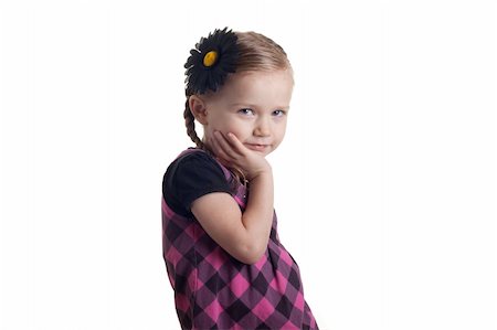 strotter13 (artist) - A curt girl standing a little slanted with her arm under her chin.  She has a laid back but serious look on her face. Stock Photo - Budget Royalty-Free & Subscription, Code: 400-04830519