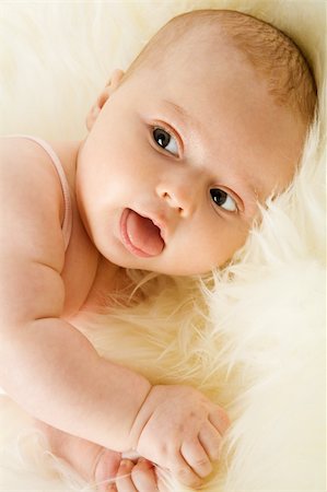 Portrait on adorable three month baby isolated on white Stockbilder - Microstock & Abonnement, Bildnummer: 400-04830565