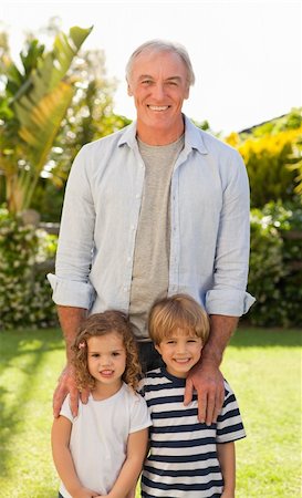 simsearch:400-06097548,k - Portrait of a family looking at the camera Photographie de stock - Aubaine LD & Abonnement, Code: 400-04830718