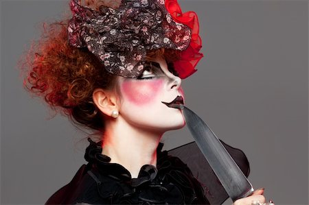 Woman mime with theatrical makeup. Studio shot. Stock Photo - Budget Royalty-Free & Subscription, Code: 400-04830747