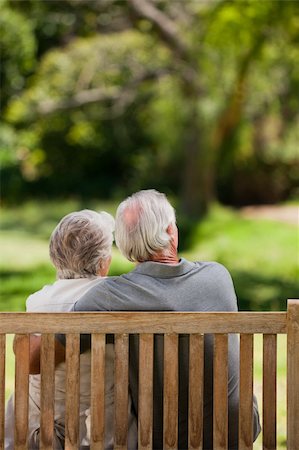 Couple sitting on the bench  with their back to the camera Stock Photo - Budget Royalty-Free & Subscription, Code: 400-04831000
