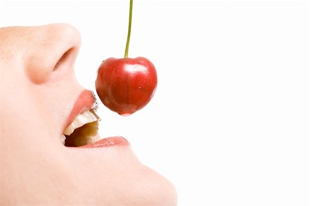 Fresh cherry and a woman's mouth isolated on white background Stock Photo - Budget Royalty-Free & Subscription, Code: 400-04831102