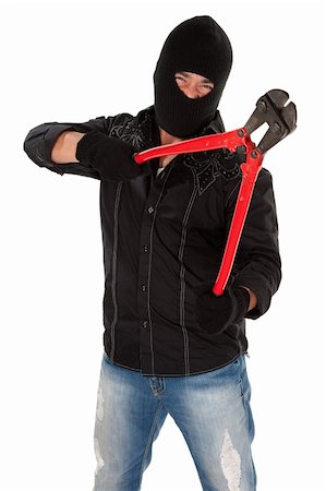 fugitivo - Masked robber holding huge red and black wire cutters Foto de stock - Super Valor sin royalties y Suscripción, Código: 400-04831179