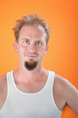 Unhappy and cranky man with a goatee Stock Photo - Budget Royalty-Free & Subscription, Code: 400-04831267