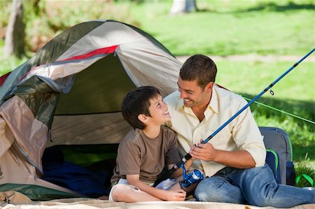 father son camping woods - Son fishing with his father Stock Photo - Budget Royalty-Free & Subscription, Code: 400-04831481