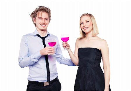 Young couple toasting with pink drink. Two people drinking. Studio photo., isolated. Stock Photo - Budget Royalty-Free & Subscription, Code: 400-04831820