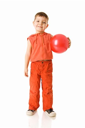 Five years Boy holding ball standing isolated on white Stockbilder - Microstock & Abonnement, Bildnummer: 400-04831977