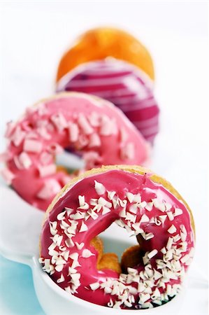 simsearch:400-06524508,k - Colorful and tasty donuts on white background Stock Photo - Budget Royalty-Free & Subscription, Code: 400-04832193