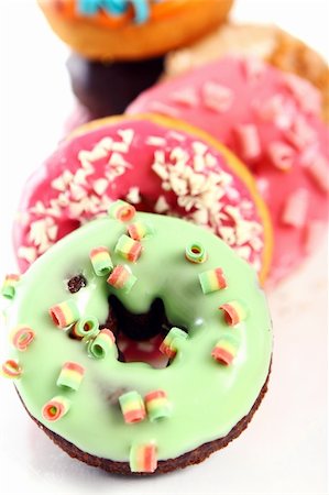 simsearch:400-06524508,k - Colorful and tasty donuts on white background Stock Photo - Budget Royalty-Free & Subscription, Code: 400-04832204