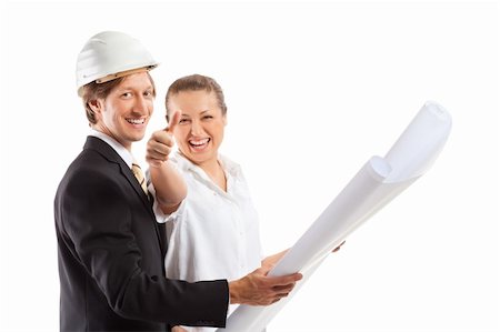 shirt technical sketch - An architect wearing a hard hat and co-worker reviewing blueprints Stock Photo - Budget Royalty-Free & Subscription, Code: 400-04832391