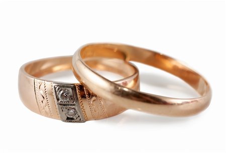 simsearch:400-04801864,k - A pair of wedding rings (male and female) isolated over white background Stock Photo - Budget Royalty-Free & Subscription, Code: 400-04832567