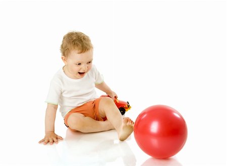 simsearch:400-04318989,k - toddler boy playing with toys  isolated on white Fotografie stock - Microstock e Abbonamento, Codice: 400-04832580
