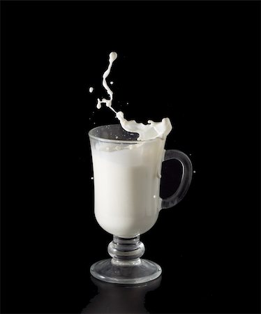 Splash in a milk glass on black background Stock Photo - Budget Royalty-Free & Subscription, Code: 400-04832796